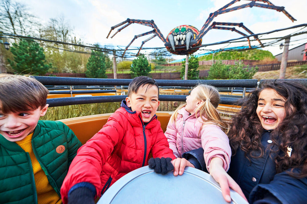 Children on Legoland Resort Windsor's Spinning Spider ride